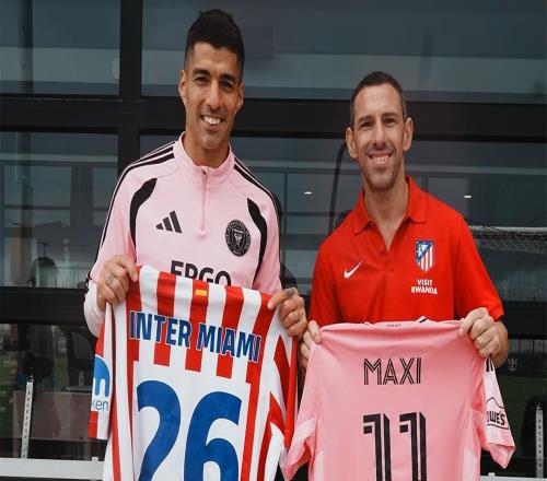 馬競在邁阿密舉辦活動,馬克西與蘇亞雷斯合影留念